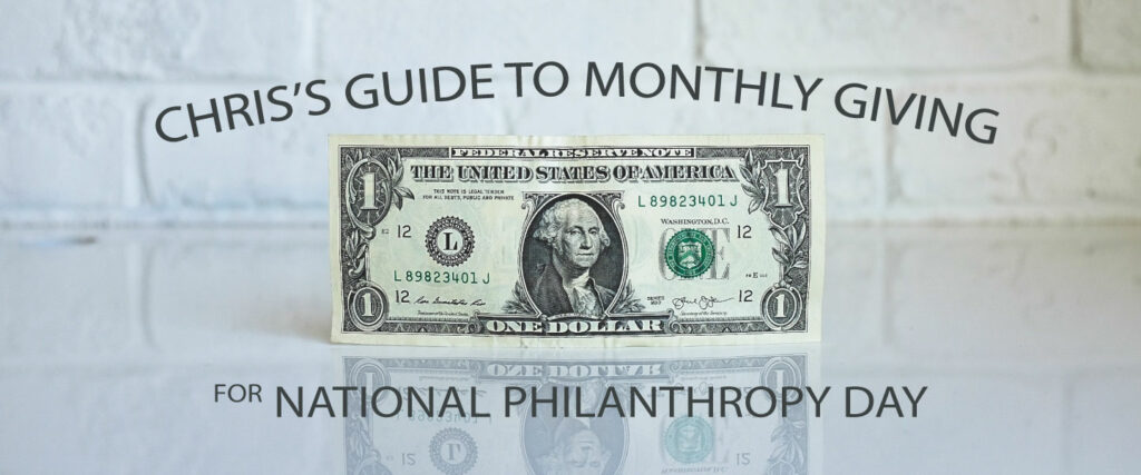 Image is a one dollar bill standing up on a white table. Text says "Chris's Guide to Monthly Giving for National Philanthropy Day"
